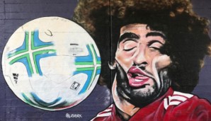 Marouane Fellainis Kult-Grimasse als Graffiti in Wien