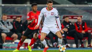 David Alaba im Duell mit seinem Teamkollegen Robert Lewandowski