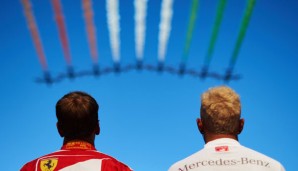 Die Erstplatzierten in Monza vor dem Start Seite an Seite: Lewis Hamilton und Sebastian Vettel