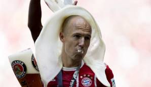 Motiv: Arjen Robben. Fotograf: Boris Streubel. Hangst: "Wichtig ist, trocken zu bleiben und den richtigen Moment abzupassen. Problem sind die vielen Menschen, die auf dem Spielfeld sind. Es nicht immer einfach, ein solch perfektes Bild festzuhalten"