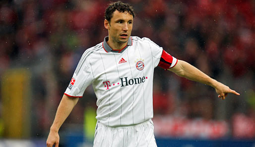 Mark van Bommel (M.) kam 2006 vom FC Barcelona zum FC Bayern München