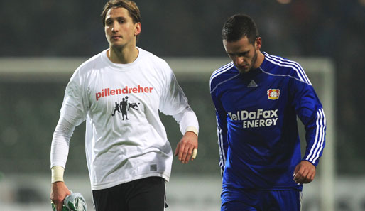 Waren nach dem 2:2 in Bremen restlos bedient: Bayers Rene Adler (l.) und Renato Augusto