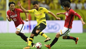 Nuri Sahin (M.) beim Testspiel des BVB in Saitama in Aktion