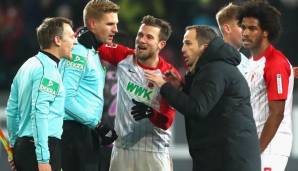 Der FC Augsburg um Kapitän Baier und Trainer Baum spielte eine gute Hinrunde