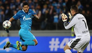 Hulk (l.) wäre offenbar gerne Teamkollege von Roman Weidenfeller (r.) beim BVB