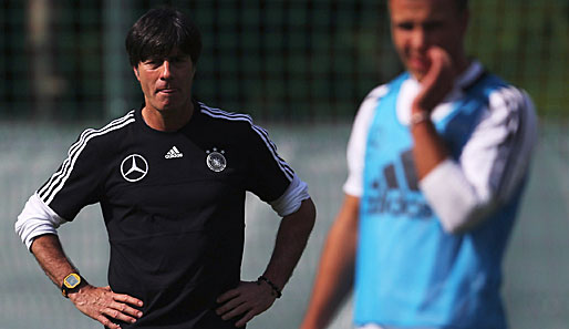 Joachim Löw (l.) und Mario Götze können wieder am Training teilnehmen