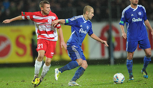 Sofien Chahed (r.) und Holstein Kiel wollen Mainz 05 aus dem Pokal werfen