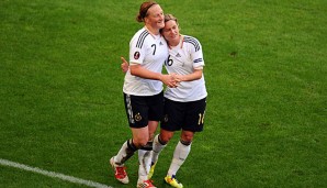 Melanie Behringer (l.) holte 2007 Weltmeister-Titel mit der DFB-Auswahl