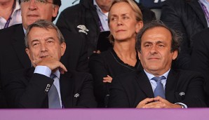 Niersbach (l.) sieht Platini (r.) in der Pflicht auf das Amt zu kandidieren