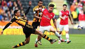 Olivier Giroud (r.) spielt seit 2012 bei Arsenal London