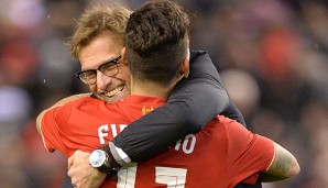 Jürgen Klopp und Roberto Firmino nach dem Sieg gegen Stoke City