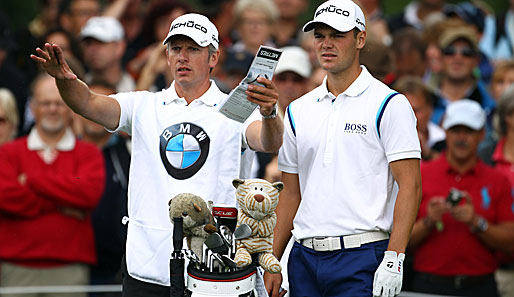 Christian Donald (l.) bleibt der Caddie von Martin Kaymer