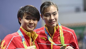 Wu Minxia (r.) hat ihre Karriere beendet