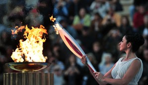 Heute unternimmt das olympische Feuer einen kurzen Spaziergang im Weltraum