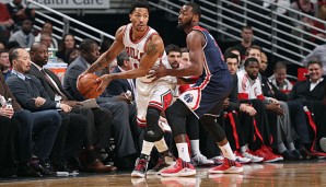 Derrick Rose (l.) lieferte sich mit John Wall erneut ein packendes Point-Guard-Duell