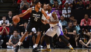 Karl-Anthony Towns (l.) gewann sein Debüt mit den Wolves